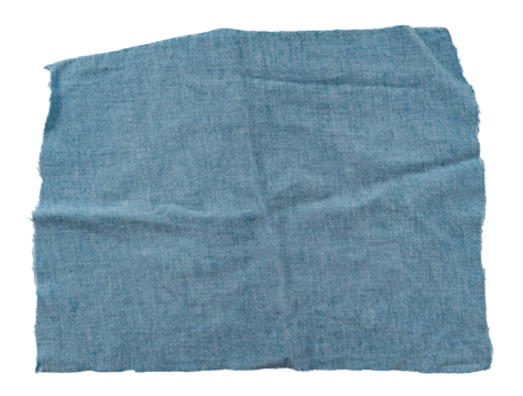 Piece of torn denim on a white background. Denim texture