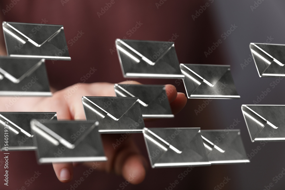 Poster Abstract image of hand interacting with floating email icons.  Perfect for technology or communication concepts.