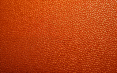 Obraz premium Close up shot of orange leather texture with detailed grain and pattern work
