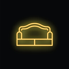 Yellow neon sign depicting a classic sofa glowing on a black background