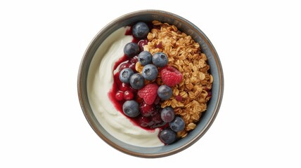 A delightful bowl of yogurt topped with granola, blueberries, raspberries, and a drizzle of berry sauce