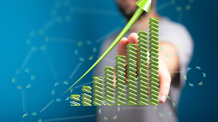 Stock photo of a hand interacting with a 3D upward trending bar graph, symbolizing growth and...