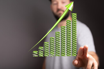 Stock photo of a green upward trending graph. Represents growth, success, and progress.