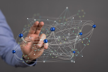 Hand interacting with a digital network, showing global connectivity and communication.