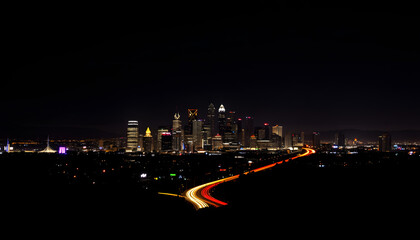 Neon Light trails in Los Angeles, silhouette. White tone