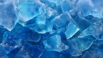 Obraz premium Close-up of shimmering blue ice fragments creating a stunning textured pattern