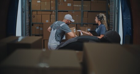 Outside of Logistics Warehouse: Diverse Employees Unloading Delivery Truck with Cardboard Boxes, Online Orders, Purchases and E-Commerce Goods. Female Manager Using Digital Tablet and Barcode Scanner.