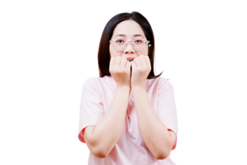 A young woman wearing glasses and a pink shirt displays a nervous or anxious expression, with hands clenched near her face.