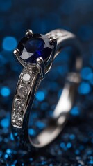 Elegant white gold ring featuring a blue stone and sparkling diamonds, set against a blue background.