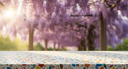 Vibrant Terrazzo Tabletop with Blooming Wisteria Background