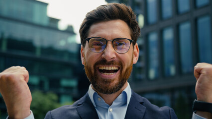 Portrait adult happy winner champion Caucasian business man male guy middle-aged businessman...