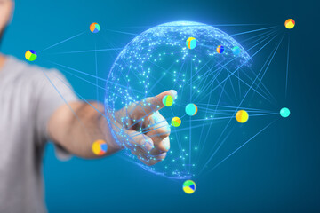 Hand interacting with a digital globe, showcasing interconnected data points.  Perfect for...