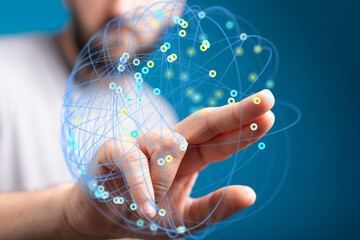 Image of a hand interacting with a digital network. Represents global connectivity, technology,...