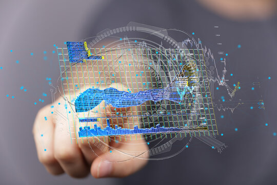 Person interacts with a holographic data display showing charts and graphs.  Modern technology concept.