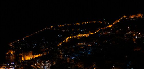 Alanya marina and boats at night with drone