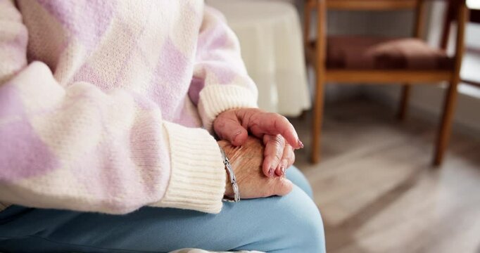 Afraid, anxiety and stress with hands of old person in bedroom of retirement home for uncertainty. Concern, fear and worry with nervous senior in apartment for difficulty, phobia or memory loss