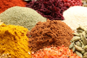 Different aromatic spices as background, closeup view