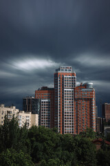 Modern house against cloudy sky