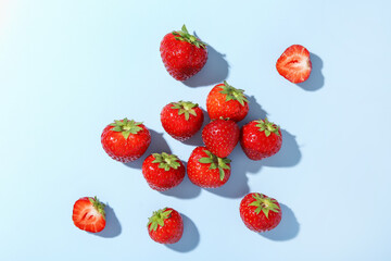 Fresh ripe strawberries on light background, flat lay