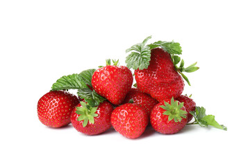 Pile of fresh strawberries and green leaves isolated on white