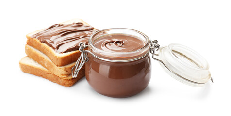Tasty chocolate butter in glass jar and slices of bread isolated on white