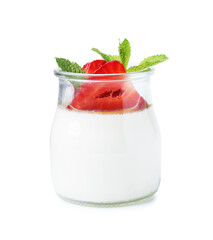 Tasty panna cotta with caramel, strawberries and mint in glass jar isolated on white