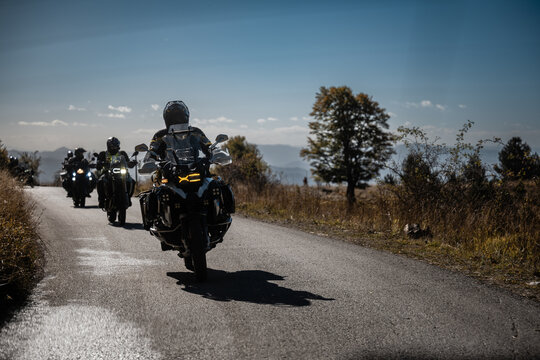 Bikers riding on scenic mountain road enjoying freedom and adventure