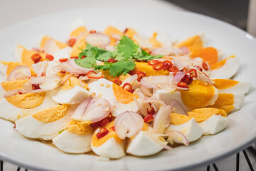 Thai cuisine, salted egg with chili on dish