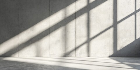Obraz premium Empty, light-filled concrete space with dramatic shadows