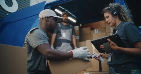 Outside of Logistics Warehouse: Diverse Employees Loading Delivery Truck with Cardboard Boxes,...