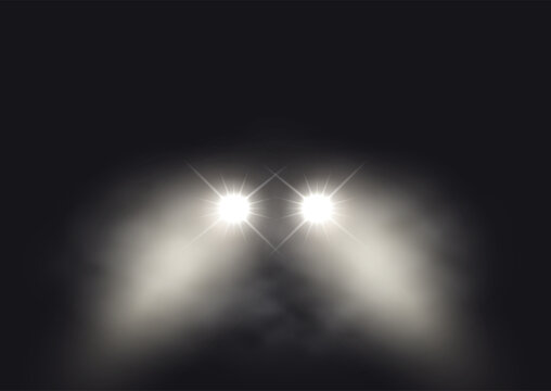 Car headlights in a foggy atmosphere