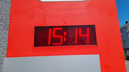 fire alarm clock on wall