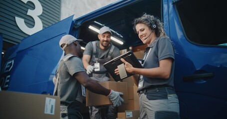 Multiethnic Workers Loading Cardboard Boxes with Online Orders, E-Commerce Goods in Delivery Truck....
