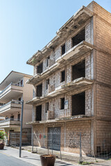 Front side of reconstruction of a house