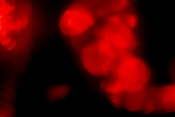 Abstract background with red color light leaks for design and special effects. Random form and...