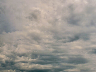 Dramatic blue cloudy sky. Nature background for design. Rainy weather.