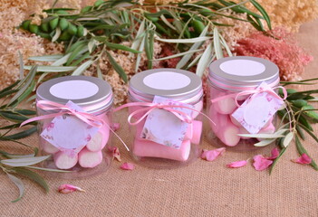 Wedding favors pink marshmallow candy transparent jar ribbon mockup label copy space baby shower...