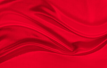Black red satin dark fabric texture luxurious shiny that is abstract silk cloth background with patterns soft waves blur beautiful.