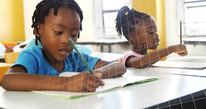 Two students writing notes igniting grid overlay with math symbols drifting over desk in education