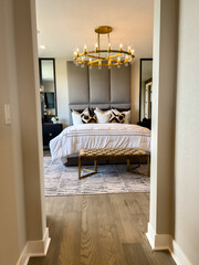 Bedroom Entrance Framed By Light Hallway Walls