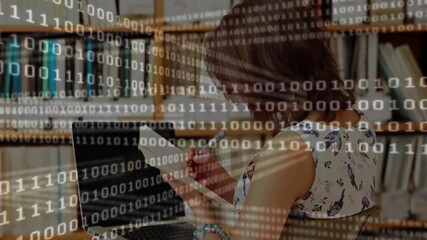 Woman lifting paper and activating binary overlay while analyzing educational charts at laptop - Powered by Adobe