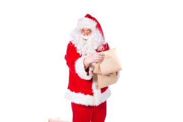 Santa Claus holding a wish list. White background.
