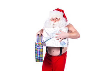 Funny fat Santa Claus holding a box with a big gift White background.