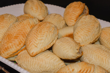 National Azerbaijani pastry with nuts - shekerbura, making pies