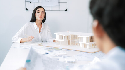 Professional asian male project manager hand puts the map on meeting table while discuss and...