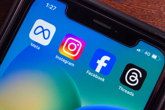 Mexico City, MEXICO - Jun 24 2025 : Smartphone display showing Meta-owned apps: Instagram, Facebook, Threads, and Meta logo. Concept of big tech social media ecosystem.