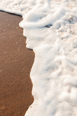 sand beach in the morning with bubbles