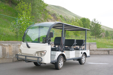Electric Shuttle Cart in a Beautiful and Scenic Landscape Perfect for Exploring Nature