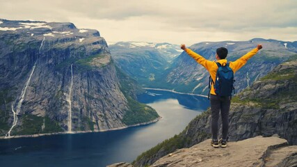 Stunning mountain view with hiker celebrating in Norway - Powered by Adobe