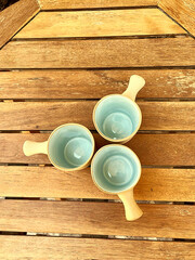 3 porcelain cups, on wood table, Beautiful fancy cup for drink tea